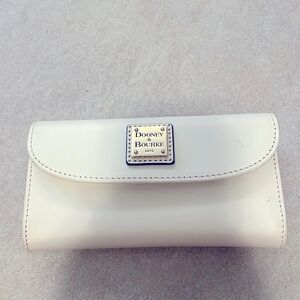 Cream colored Dooney and Bourke wallet